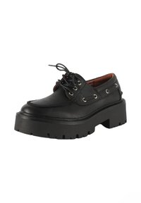 Scarpe stringate in pelle nera con suola platform spessa, caratterizzate da occhielli in metallo e una texture liscia. Progettate con una punta arrotondata.