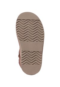 Semelle de chaussure en caoutchouc de couleur brun clair avec une surface texturée. Présente des motifs en zigzag pour l'adhérence et un bord arrondi lisse au niveau des orteils.