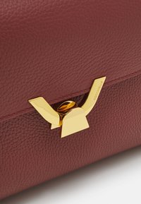 Coccinelle DEW - Handbag - bordeaux