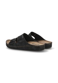 Sandalias de ante negro con dos hebillas de metal ajustables. Cuenta con una plantilla contorneada y costuras beige en contraste a lo largo de la suela.