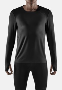 Czarna, długosleeve'owa koszulka sportowa wykonana z elastycznego materiału o gładkiej teksturze, z okrągłym dekoltem i minimalnym logo.