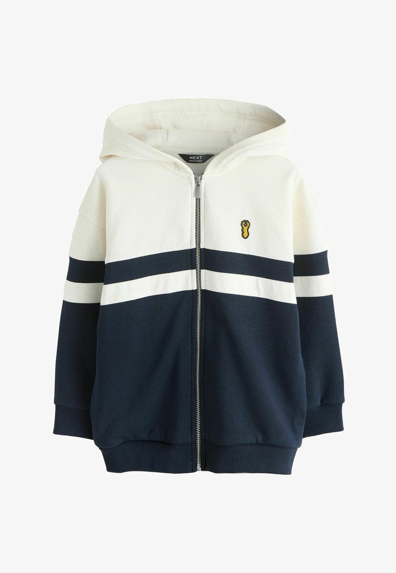 Wit en marineblauw vest met rits en horizontale strepen, met een klein geel mierlogo op de borst, voorzien van een capuchon en geribbelde boorden.