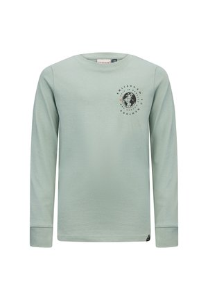 Camicia a maniche lunghe verde chiaro in tessuto morbido, con scollo rotondo e grafica di un globo nero con il testo "Amsterdam" sul petto.