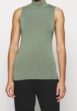 Mouwloos, nauwsluitend coltruitje in lichtgroene katoenmix. Gladde textuur met een hoge kraag, zoom eindigt op de heup.