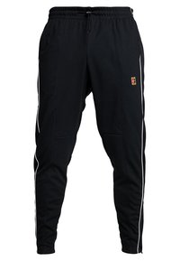 Zwarte joggingsbroeken gemaakt van een zachte stof. Heeft witte zijkanten en een elastische tailleband met een trekkoord voor een aanpasbare pasvorm.