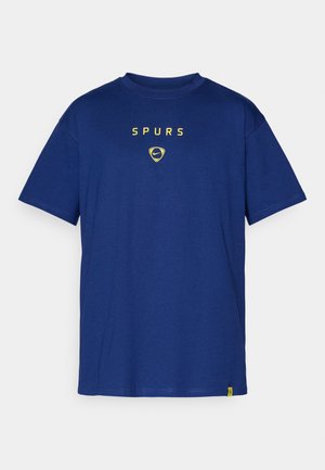 Navyblaues Baumwoll-T-Shirt mit Rundhalsausschnitt und kurzen Ärmeln, mit dem Schriftzug "SPURS" und einem gelben Nike-Logo in der Mitte.
