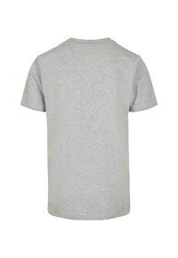 Grå t-skjorte med korte ermer, rund hals, laget av mykt stoff, med en glatt tekstur og et ensfarget design, har en avslappet passform.