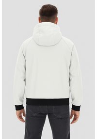 Felpa grigia chiara con un ampio cappuccio arrotondato, polsini e bordo in costina nera. Tessuto liscio, vestibilità regolare e maniche raglan.