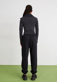 adidas Originals Träningsbyxor - black