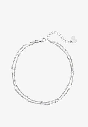 Pulsera de plata con cadenas entrelazadas, que presenta eslabones planos y alargados, así como pequeños acentos esféricos. Incluye un cierre de langosta y una cadena de extensión.