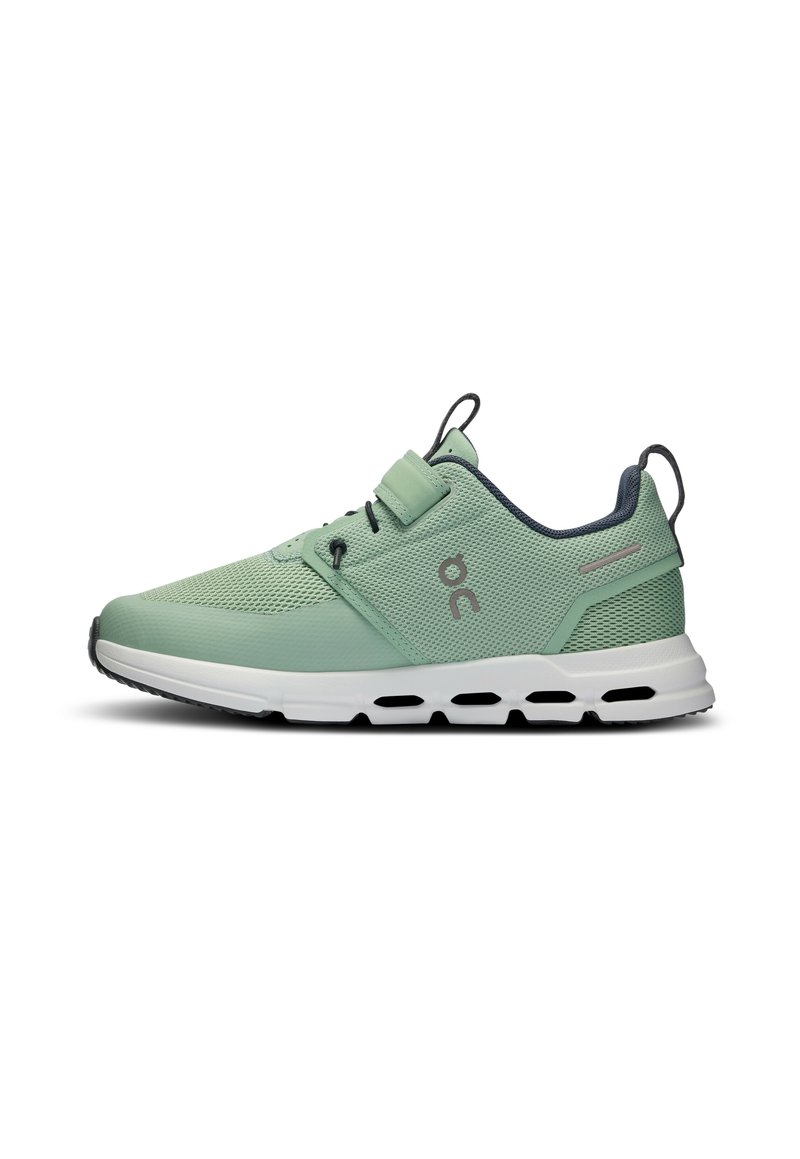 Light green athletic shoes with a breathable mesh upper, white midsole, adjustable lace system, and a textured rubber outsole.