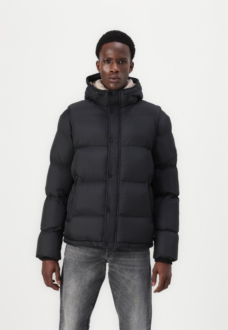 Black puffer jacket with horizontal stitching, stand-up collar, and hood. Smooth, water-resistant fabric with front buttons and side pockets.