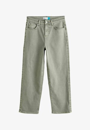 Valged hallid sirge säärega teksapüksid, millel on esimesed taskud, vöököid ja vöökoha nööpsulgur.