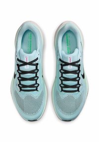 Light blue athletic shoes with a mesh upper, black laces, a pink logo, and a textured sole designed for running.
