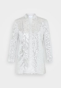 Långärmad kavaj med öppen front som är täckt av glänsande silverpaljetter och har en vit innerfoder.