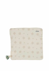 Bomullspläd i krämfärg med ljusbeiga klövermönster. Inkluderar en napphållare i ett hörn. Mjuk textur och rektangulär form.