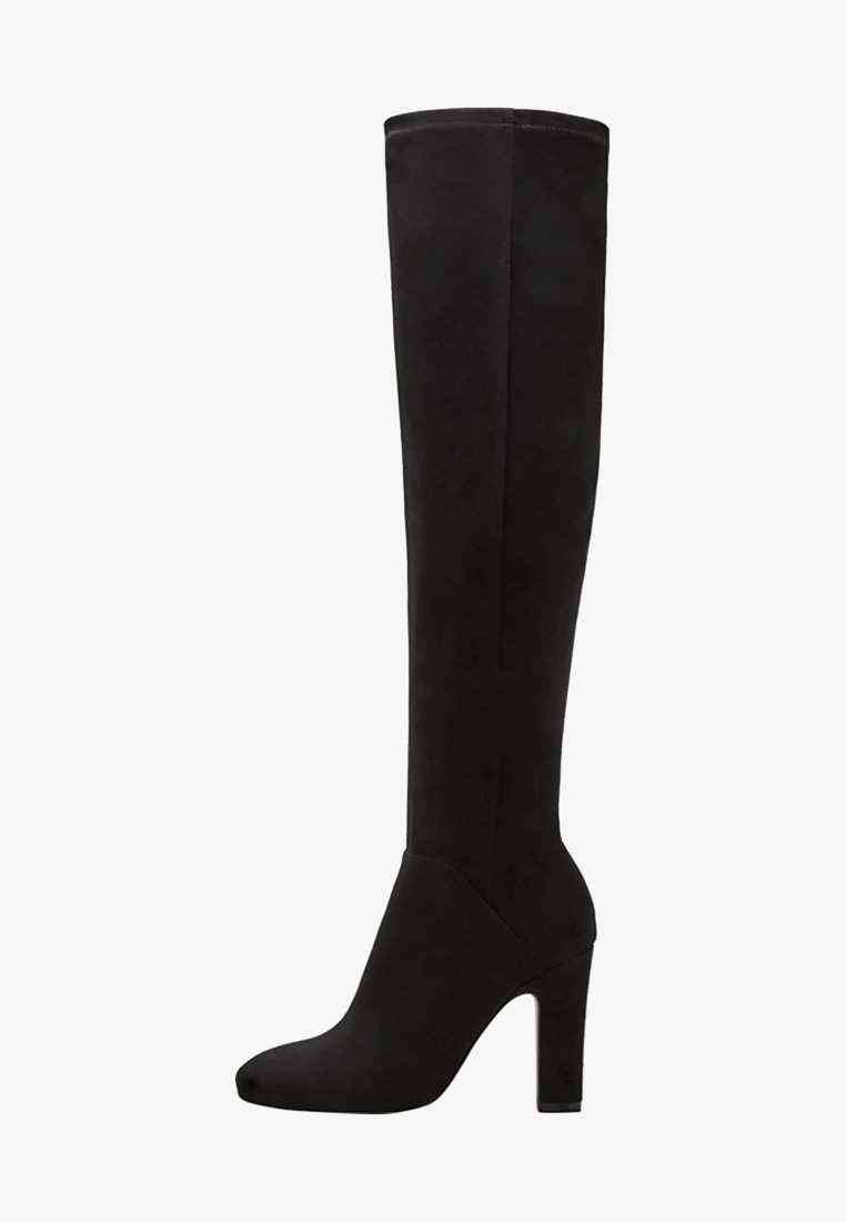 Bottes over-the-knee en suede noir avec un talon épais, présentant une texture lisse et un design élégant et épuré.