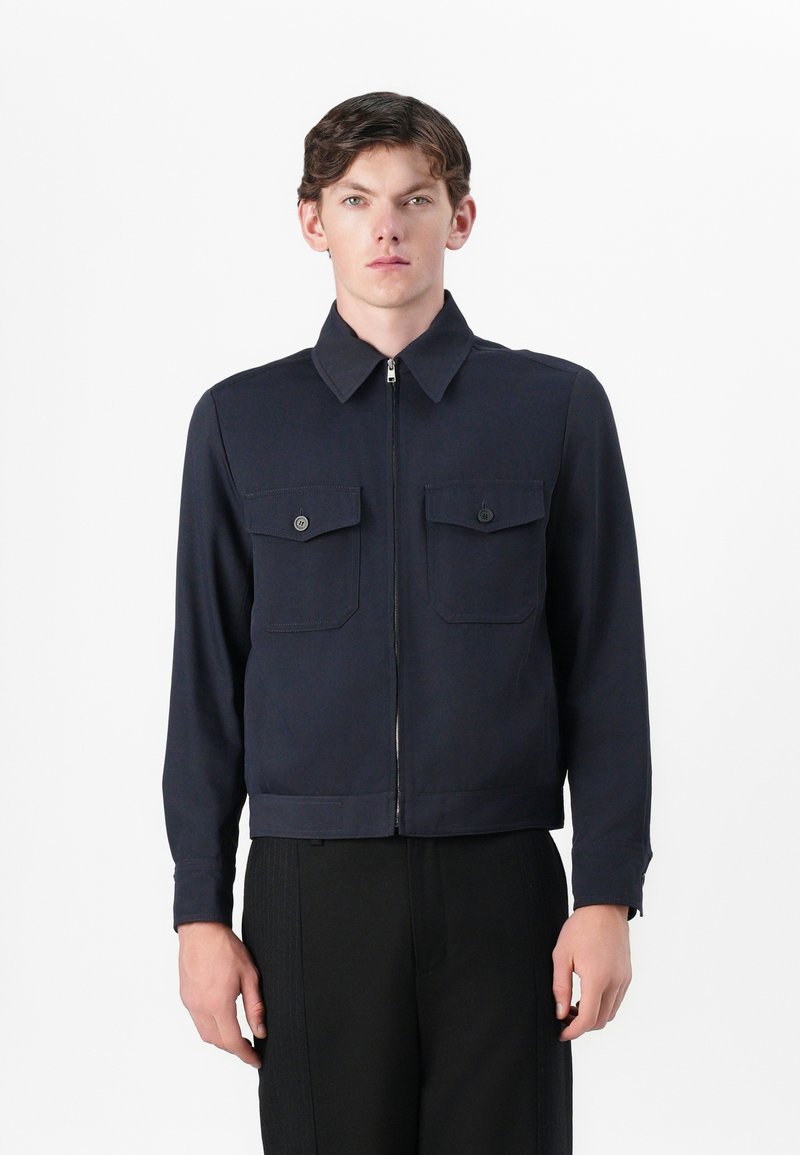 sandro Lichte jas donkerblauw