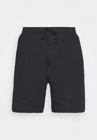 Shorts de sport bleu marine en tissu doux mélange de coton, avec une taille élastique ajustable par cordon et une poche avant unique.