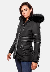 Black padded jacket with faux fur hood, sleek texture, leather accents, front pockets, and button and zipper closures.