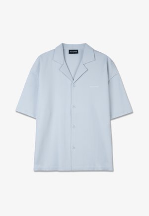 Heledad sinise värvi lühikeste varrukatega särk terava kraega, vertikaalse soonilise tekstuuriga, esiosas nupuga kinnitamine ja tagasihoidlik kaubamärgi logo rinnal.