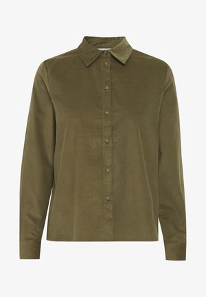 Olīvu zaļa korduroja krekls ar pogājamās priekšpuses, apkakli, garām piedurknēm un sešām pogām redzamām centrā. Tekstūrēts auduma apdare.