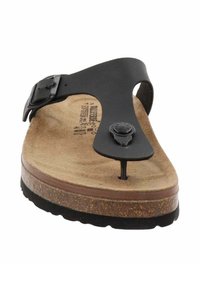 Sandalo nero con design a striscia tra le dita, soletta in sughero, texture simile alla pelle scamosciata e fibbia. Presenta un sottopiede marrone e un suola in gomma nera.