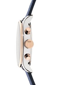 Silver-tone watch with a round case, featuring a white dial, rose gold accents, two buttons, and a dark blue leather strap.