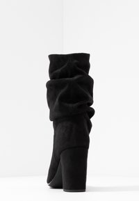 Unisa Stivaletti - black