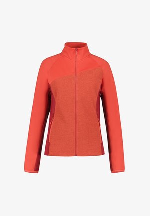 Veste rouge pour femme avec fermeture éclair intégrale, panneau avant texturé, manches lisses, col montant et poches latérales zippées.