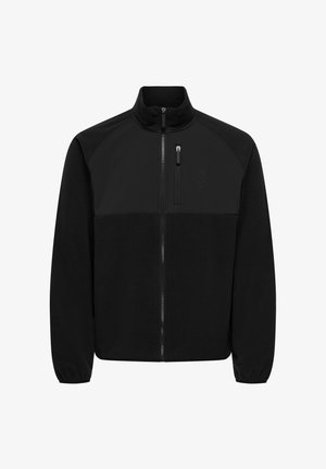 Črni flis jopič z zadrgo spredaj, visokim ovratnikom in teksturirano zgornjo ploščo. Ima manjši žep na prsih in elastične manšete.