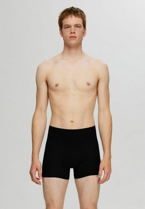 Sorte boxershorts lavet af et glat, strækbart stof. Designet har en blød elastisk talje og en tætsiddende form for komfort.