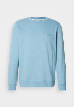 Hea sinine puuvillasegusest kangast sweatshirt, millel on ümmargune kaelus, pikad varrukad, soonikkoes mansetid ja õrn tekstuuriline muster.