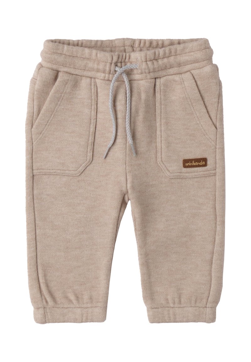 Beige Baumwoll-Sweatpants mit elastischem Bund, Kordelzug und zwei vorderen Taschen. Mit einem kleinen braunen Logosticker.
