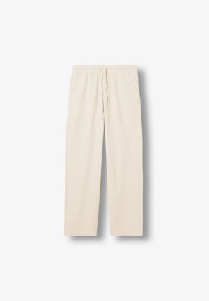 Pantaloni casual color crema con elastico in vita e coulisse, taglio dritto e tasche laterali su sfondo bianco.