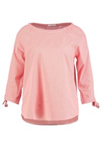 Chemisier rayé rose à manches trois-quarts, avec des détails de nouage aux poignets et un col rond. Tissu léger avec une coupe décontractée.