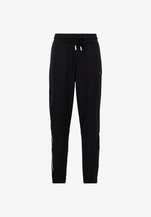 Black jogger pants with an elastic waistband and drawstring, featuring subtle side stripes and tapered cuffs for a fitted look.