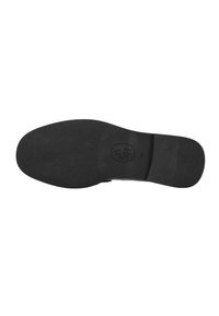 Suola di scarpa in pelle nera con superficie texturizzata, impronta del logo circolare e parte posteriore liscia. Design piatto con una leggera curvatura nella punta.