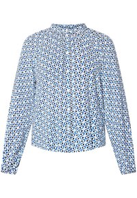 Chemise à boutons en tissu bleu clair, présentant un motif abstrait répété en bleu foncé et blanc. Col arrondi et manches longues.
