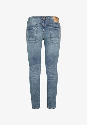 Slank jeans i lys blå denim med et klassisk fem-lommer design, synlige syninger og et lædermærke ved taljen.