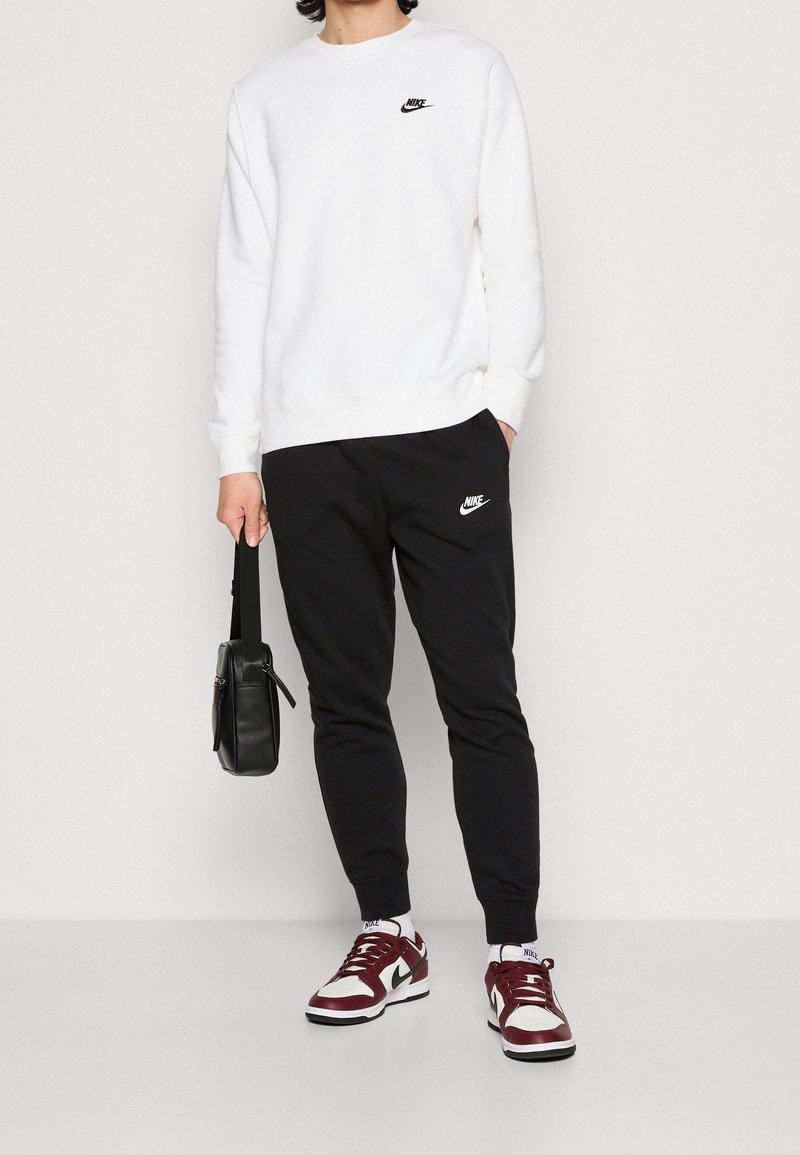 Nike Sportswear Pantalones deportivos black/negro (Segunda