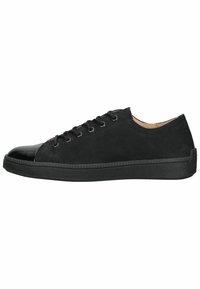Black sneaker with a matte suede upper, glossy patent leather toe cap, round laces, and textured rubber sole. Low-top design.