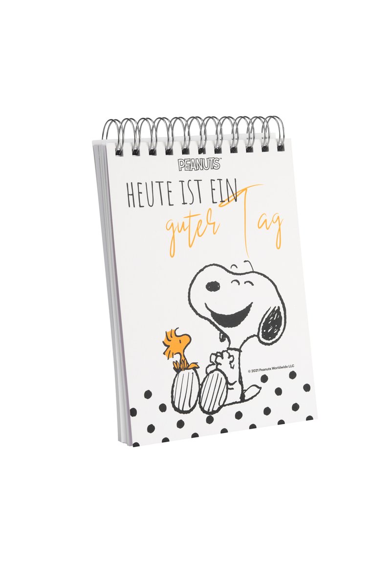 Quaderno ad anelli con copertina bianca a pois neri, un'illustrazione di Snoopy e Woodstock, e testo in tedesco in arancione e nero.