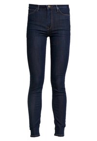 Pantalones vaqueros skinnies de mezclilla azul oscuro con una cintura alta, que presentan un estilo de cinco bolsillos y costuras sutiles en las costuras.