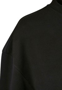 Urban Classics Pulóver - black
