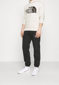 The North Face Jersey con capucha - white