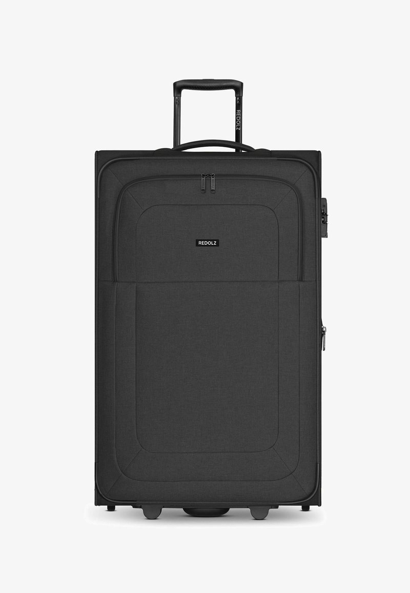 Valigia nera con esterno in tessuto liscio, tasche con cerniera, manico estraibile e quattro ruote per una facile mobilità.