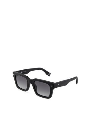 Gafas de sol negras con montura cuadrada, lentes con degradado oscuro y sutiles detalles metálicos en las esquinas delanteras y las varillas.