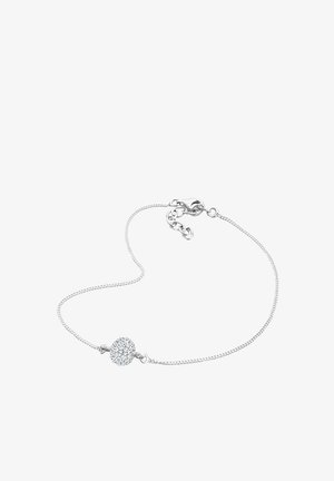 Sølv kædearmbånd med en rund, glitrende accent i midten. Delikat design med en hummerlås og fint detaljerede led.