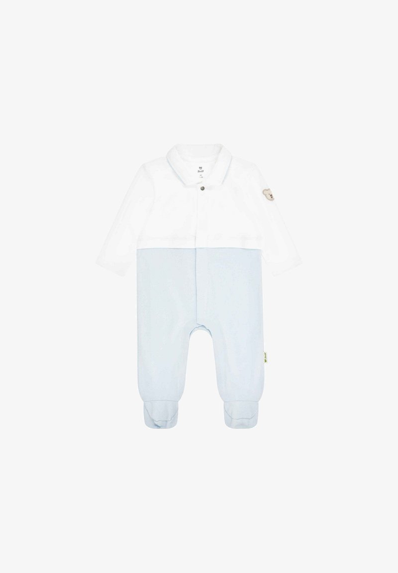 Tutina azzurra chiara con maniche lunghe, parte superiore bianca, chiusure a scatto e motivo orsetto sul braccio sinistro. Tessuto morbido con una superficie liscia.